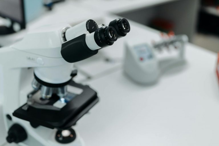 Detailed image of a microscope in a scientific laboratory environment.